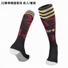 2022 World Cup Germany red black soccer socks away